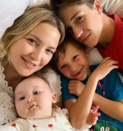 Ryder with his mother and siblings